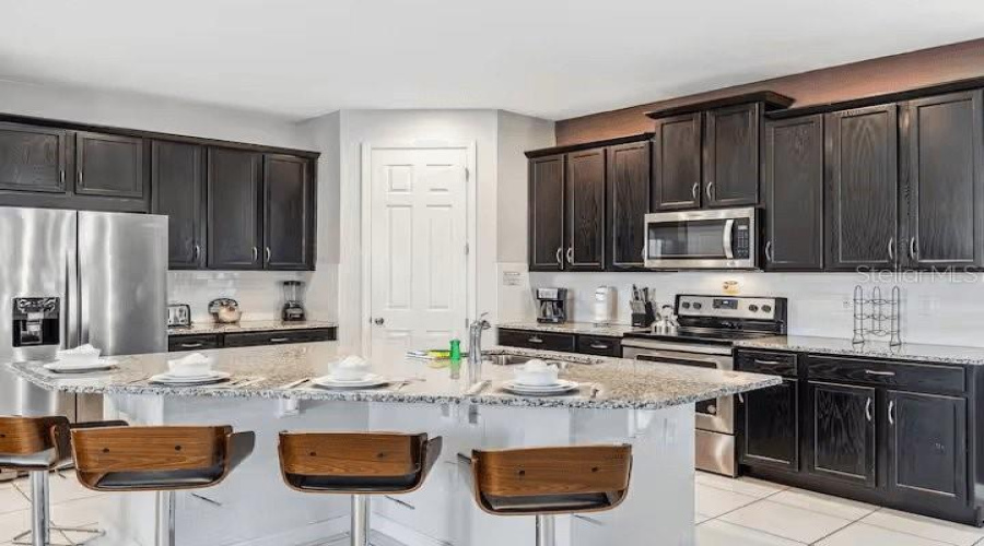 KISSIMMEE, Florida 34747, 5 Bedrooms Bedrooms, ,5 BathroomsBathrooms,Residential,For Sale,SANDY PARK,0,MFRO6346462