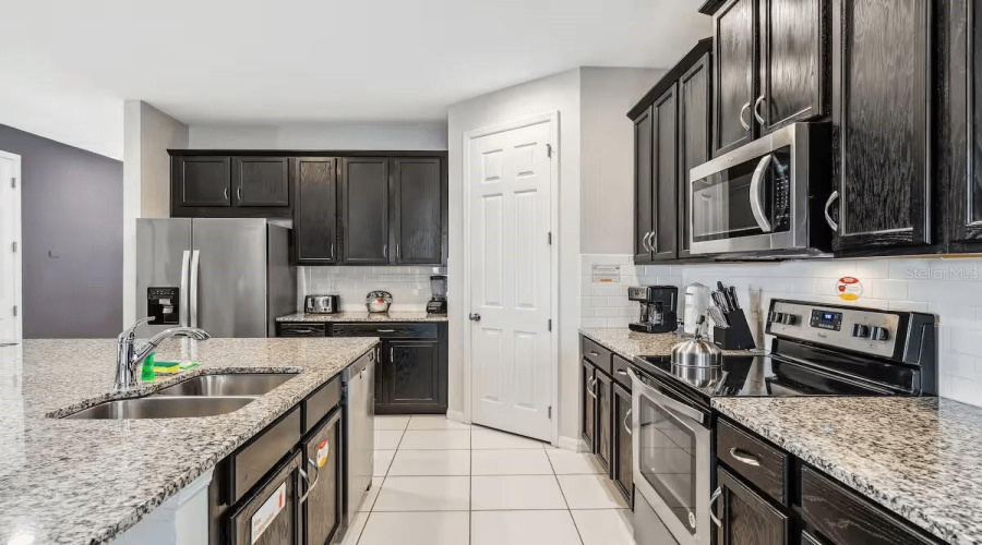 KISSIMMEE, Florida 34747, 5 Bedrooms Bedrooms, ,5 BathroomsBathrooms,Residential,For Sale,SANDY PARK,0,MFRO6346462