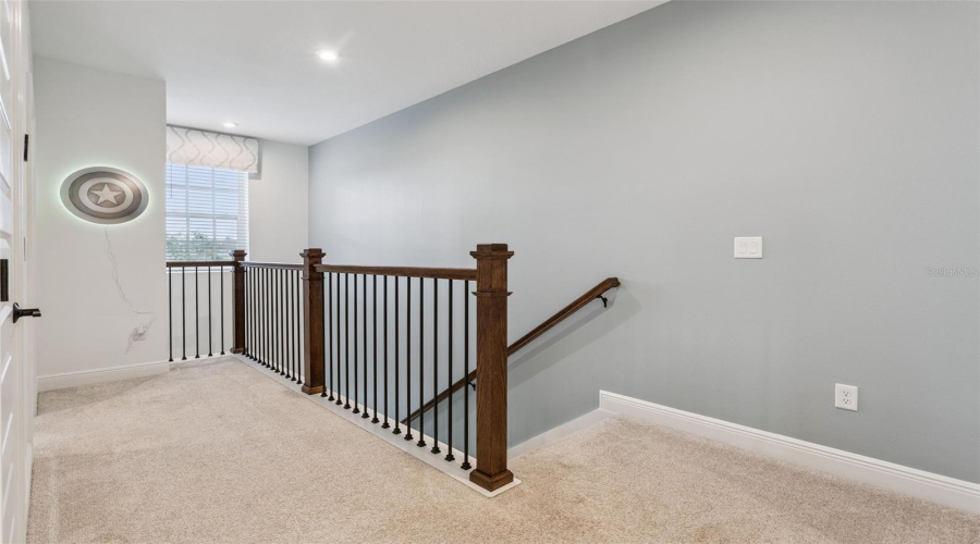 Upstairs landing with upgraded wrought iron banister