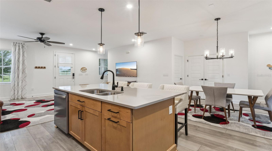 The kitchen flows seamlessly into the Great Room and Dining Area