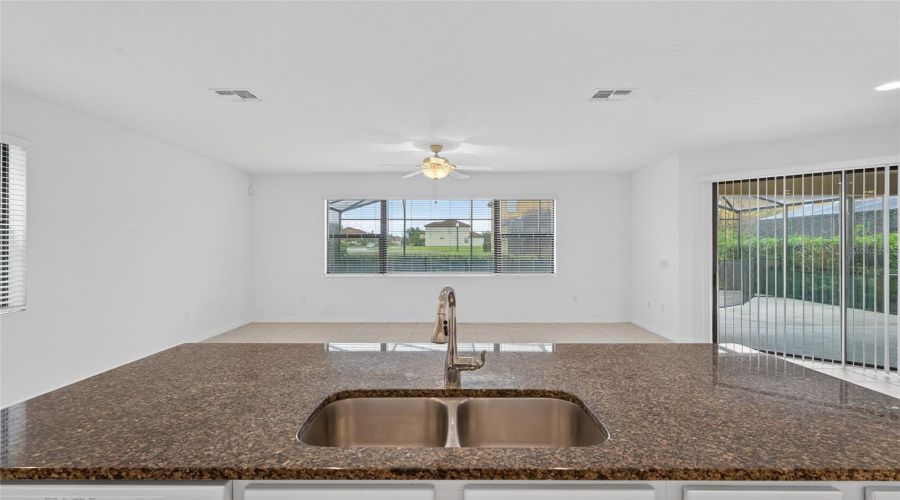 Kitchen overlooking lounge area