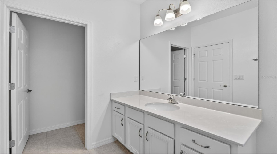 Bathroom to bedroom 1