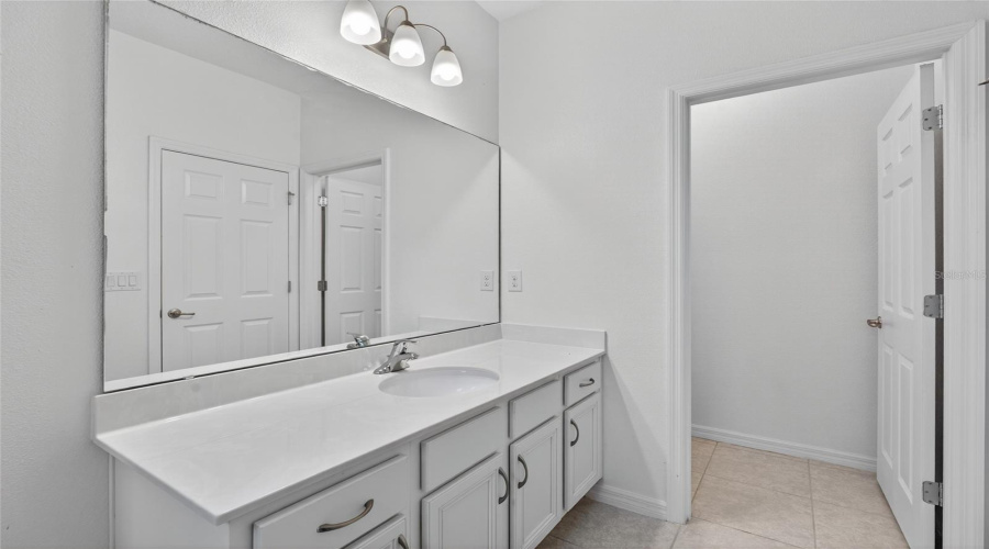 Bathroom to bedroom 1