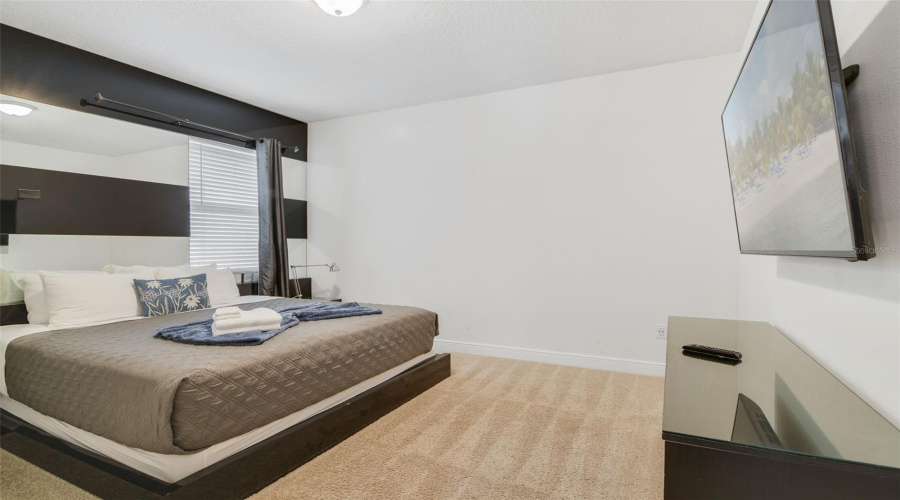 Two of the 8 Bedrooms are located on the main floor and include en suite Baths.
