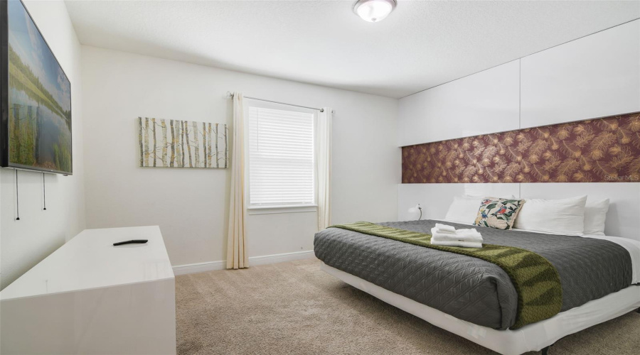 Two of the 8 Bedrooms are located on the main floor and include en suite Baths.