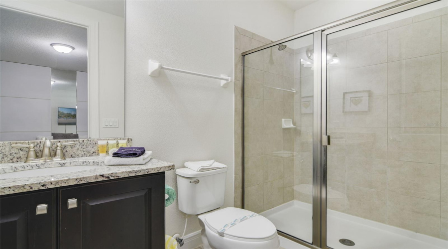 Bedroom 6's en suite Bath.