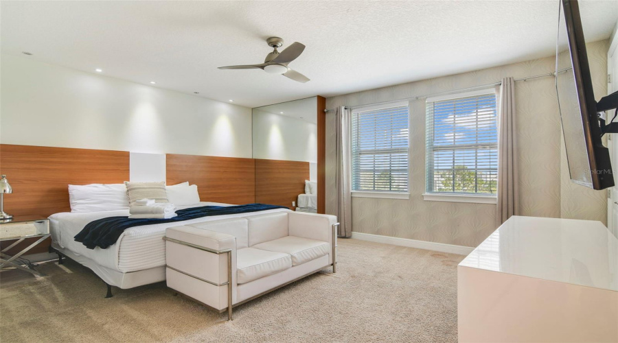 The inviting Primary Suite on the upstairs floor offers generous space and a well-appointed en suite Bath for your comfort.