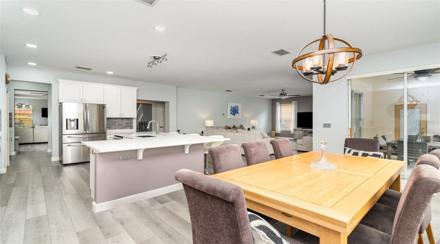 Large kitchen with full size dining area and breakfast bar.