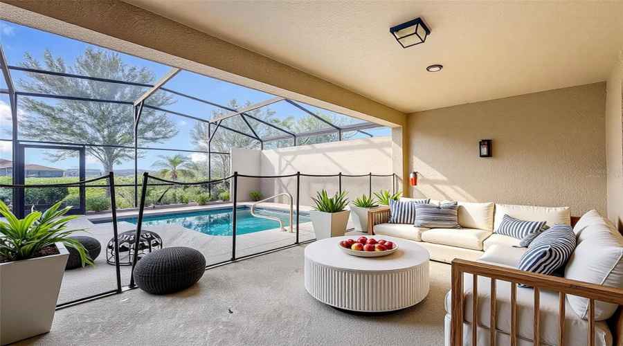 Virtually Staged- Covered and Screen Patio with Pool