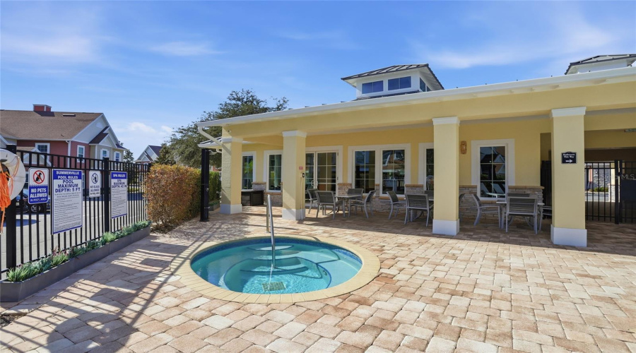 Large covered porch to enjoy after a swim