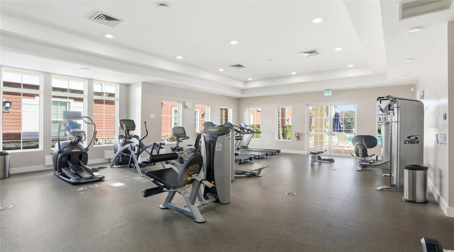 Light and bright fitness center with large windows