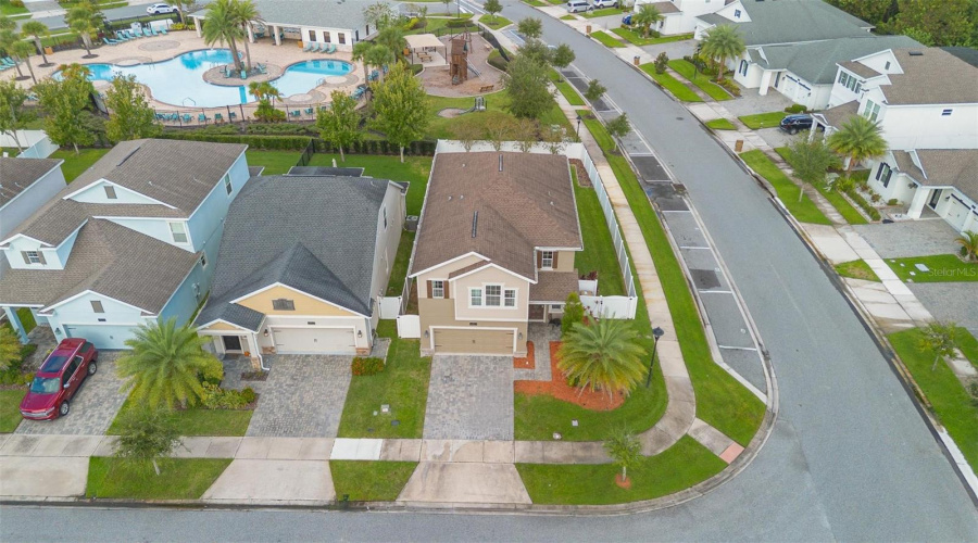 Located right by the community pool and playground