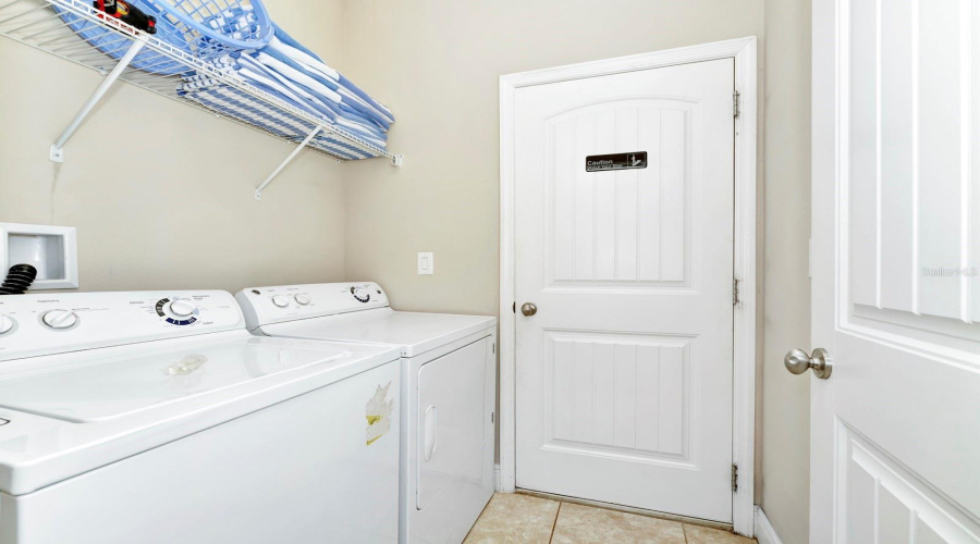 Laundry Convenience – Spacious Utility Room with Built-In Storage