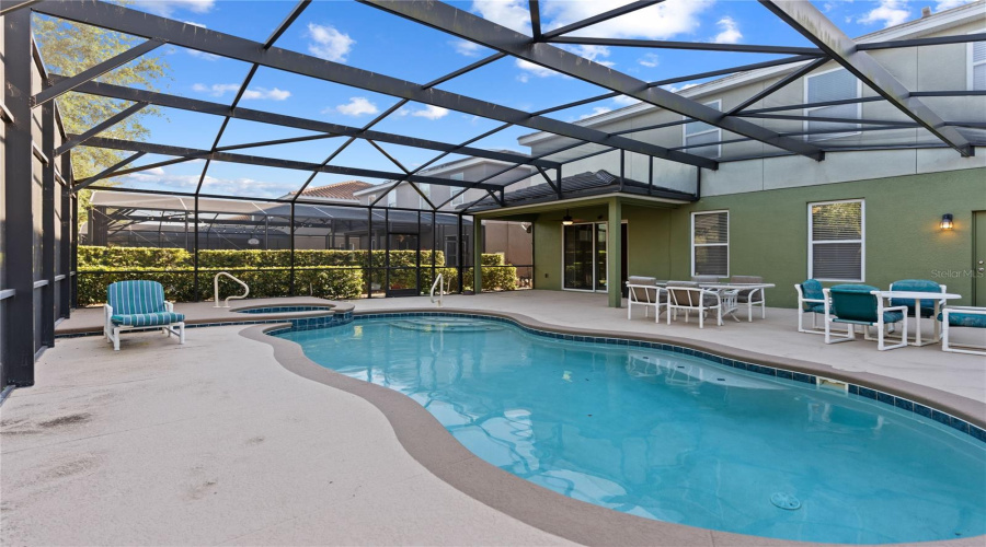 large pool with spa for everyone to enjoy