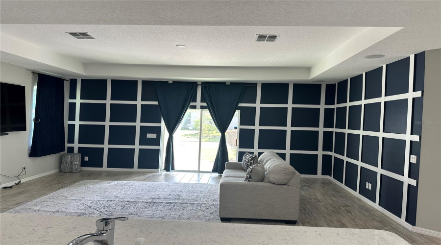 family room with custom checkered walls family room with custom checkered walls