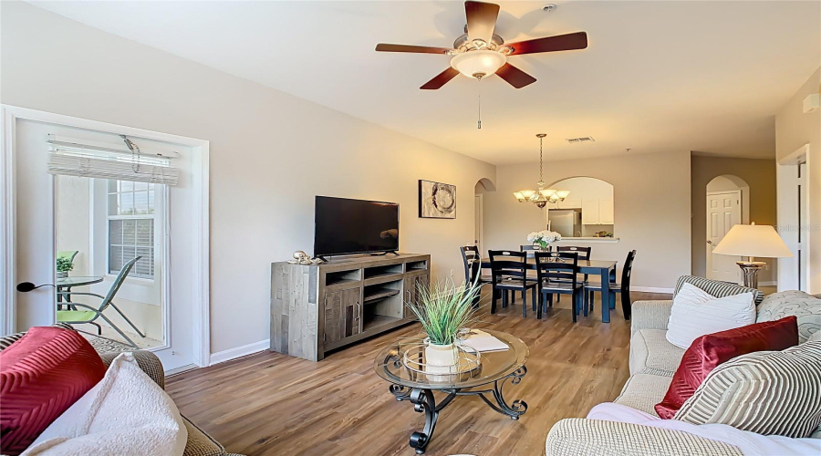 Living Room – Bright open layout with new flooring. Living Room – Bright open layout with new flooring.