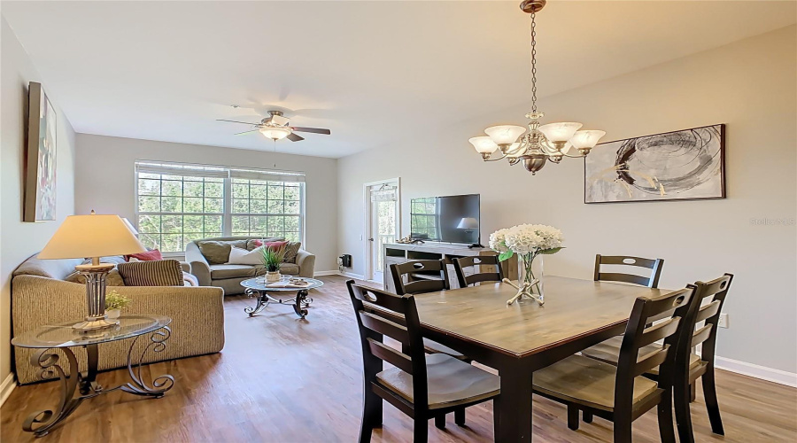 Open-concept living and dining area, ideal for entertaining guests or creating cozy family moments! Open-concept living and dining area, ideal for entertaining guests or creating cozy family moments!