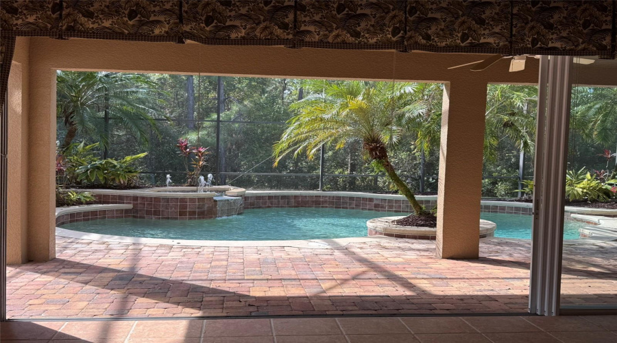 Glass Sliders Opened to encorporate outdoors into the Family Room Glass Sliders Opened to encorporate outdoors into the Family Room