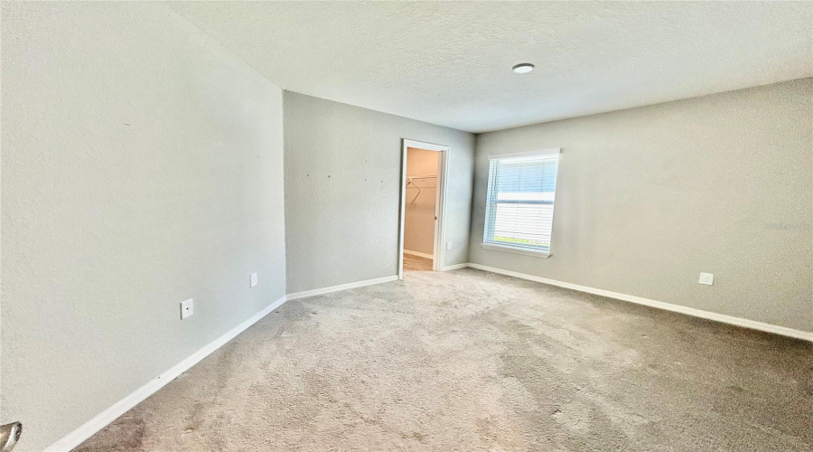 Bedroom 2 with walk in closet Bedroom 2 with walk in closet