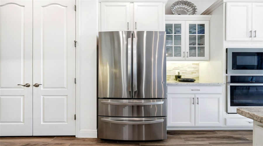 Huge pantry, wall oven and microwave.