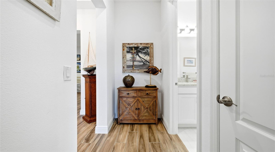 Guest bedroom and bath alcove off to the right of the entry.