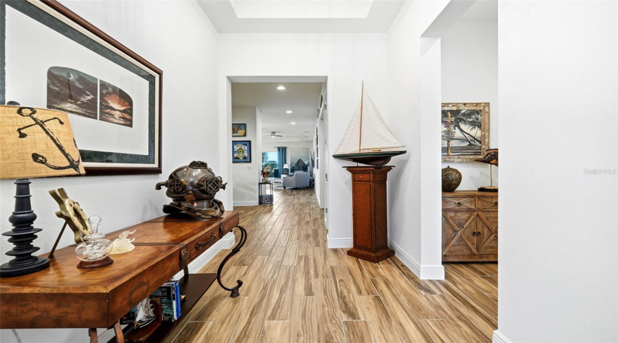 Looking from the front door entry through to the great room.