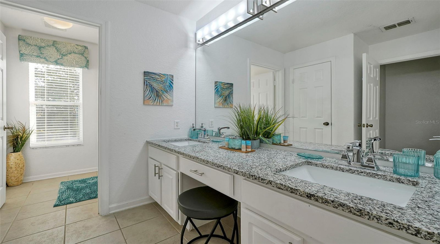 Bathroom 4, dual vanities, 2nd floor, newer granite counters