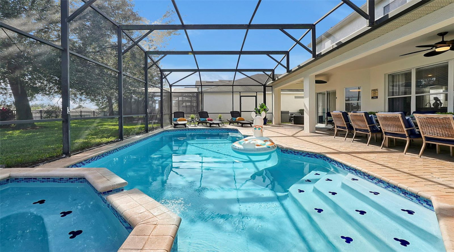 Pool and spa with Mickey mouse tiles