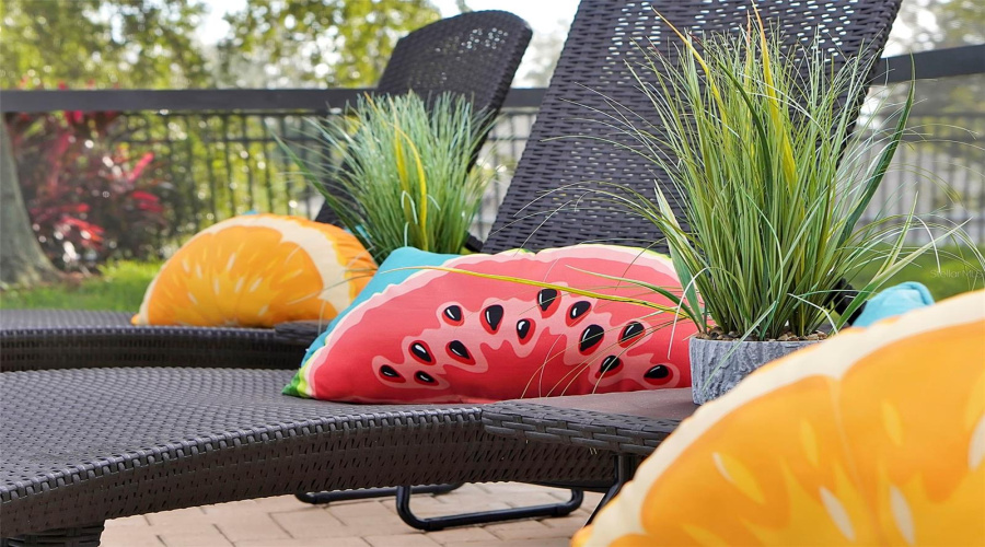 Pool with comfortable lounging area,  pillow menu