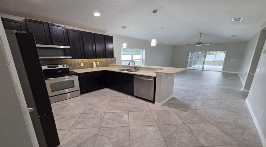 DAVENPORT, Florida 33837, 4 Bedrooms Bedrooms, ,2 BathroomsBathrooms,Residential,For Sale,WHISPERING PINES,0,MFRA4669671