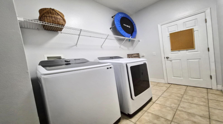 Laundry Room with Samsung Washer & Dryer included
