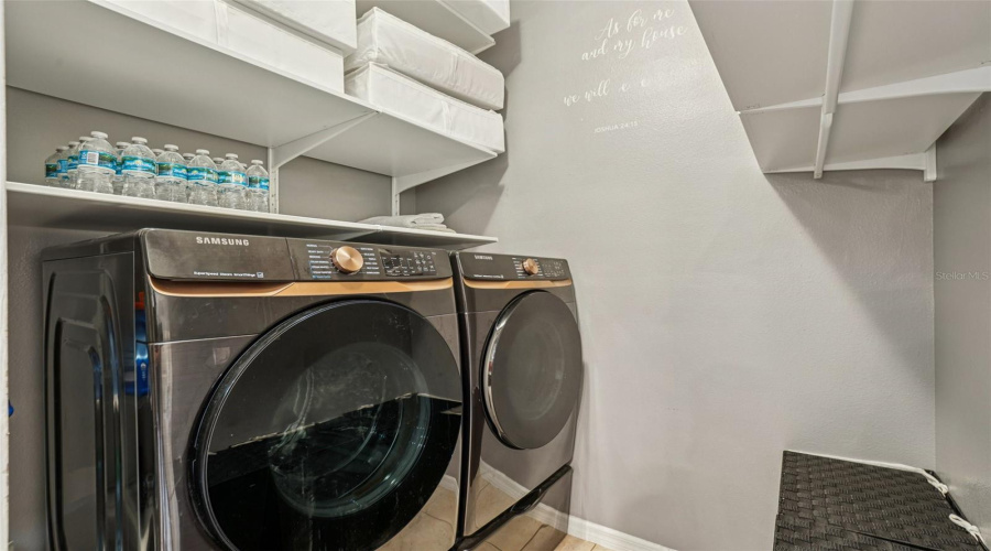Laundry room with extra storage.