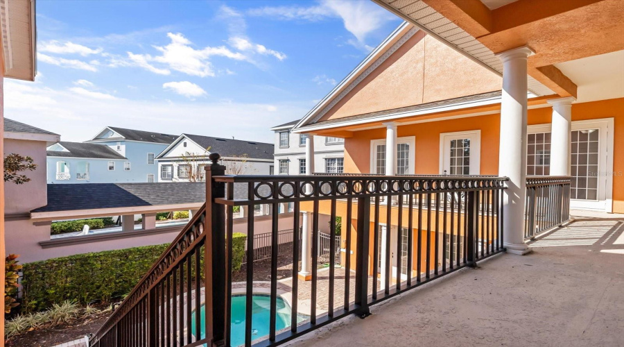 Stairs leading to courtyard pool from 2nd floor