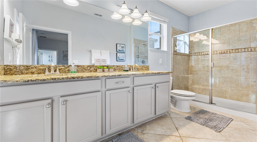 First floor - Bathroom 02/pool bath with double vanities.