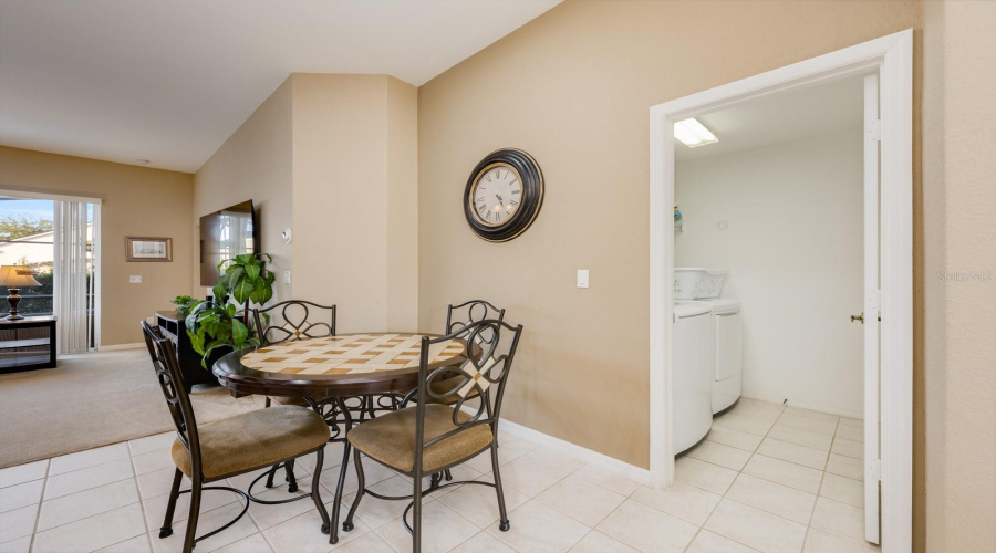 The cozy breakfast nook is just the spot to enjoy your morning coffee and start your day.