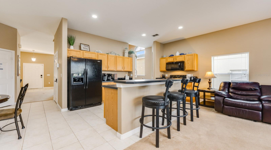 A generous center island offers extra prep space and room for counter-height seating.