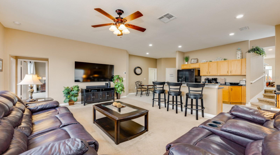 Conveniently adjacent to the Kitchen, the expansive Family room invites connection and comfort.