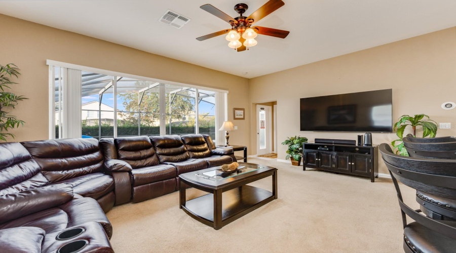 Sliding doors lead directly to the PRIVATE POOL/SPA area—just one of many luxury touches.