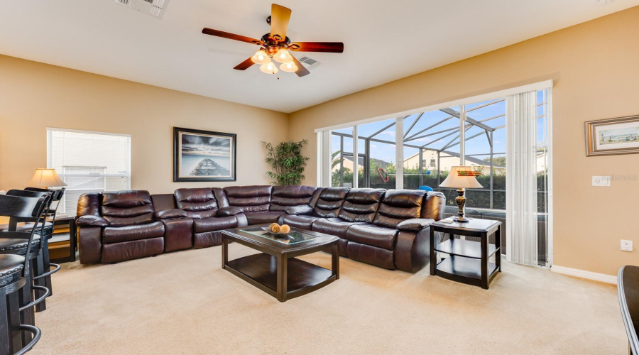 Bathed in natural light, the Family Room offers a bright and airy setting, creating a warm, cheerful ambiance.