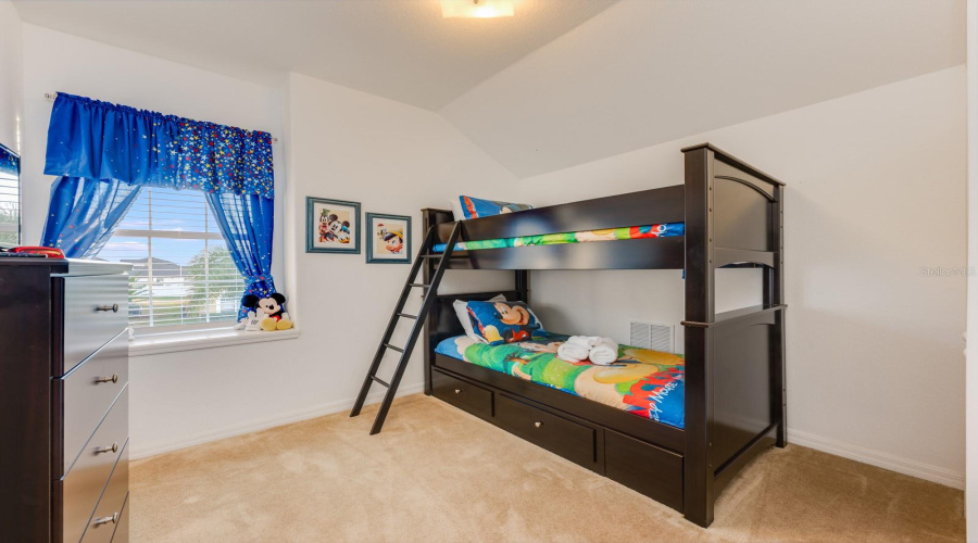 A Disney–themed Bedroom 4 adds a touch of fun and whimsy, making it a favorite spot for younger guests.