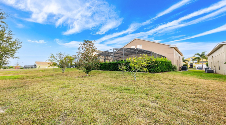The expansive backyard offers endless possibilities for entertaining and enjoying the outdoors.