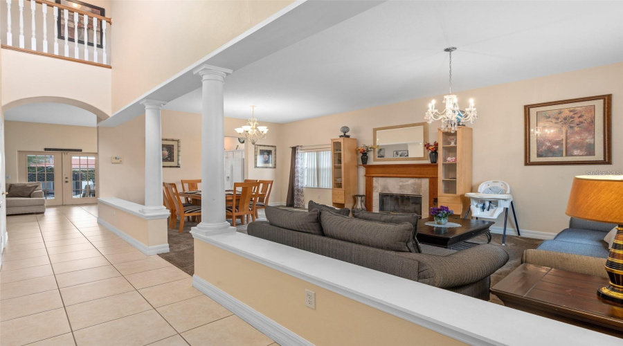 The two story foyer  is open to formal and casual living spaces.
