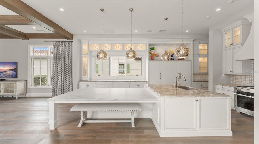 Gorgeous kitchen with extra large island for dine in space..