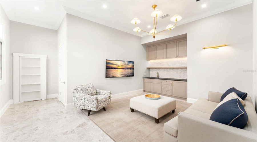 Second den/flex space for extended stay guests, kids, in-laws, etc. And another concealed door that leads to...