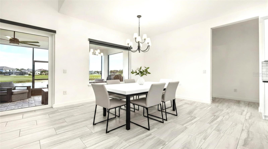 Virtually Staged adding the dining room table and chairs.