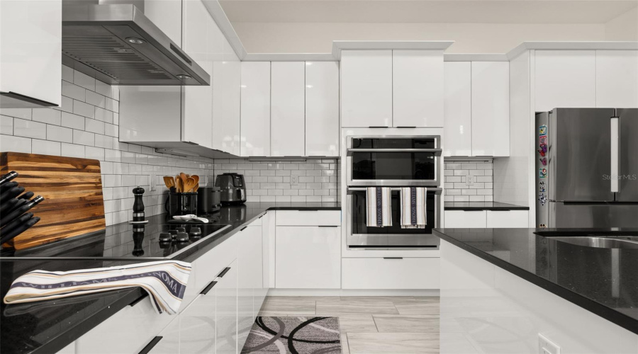 European Cabinetry and Striking Stone Countertops