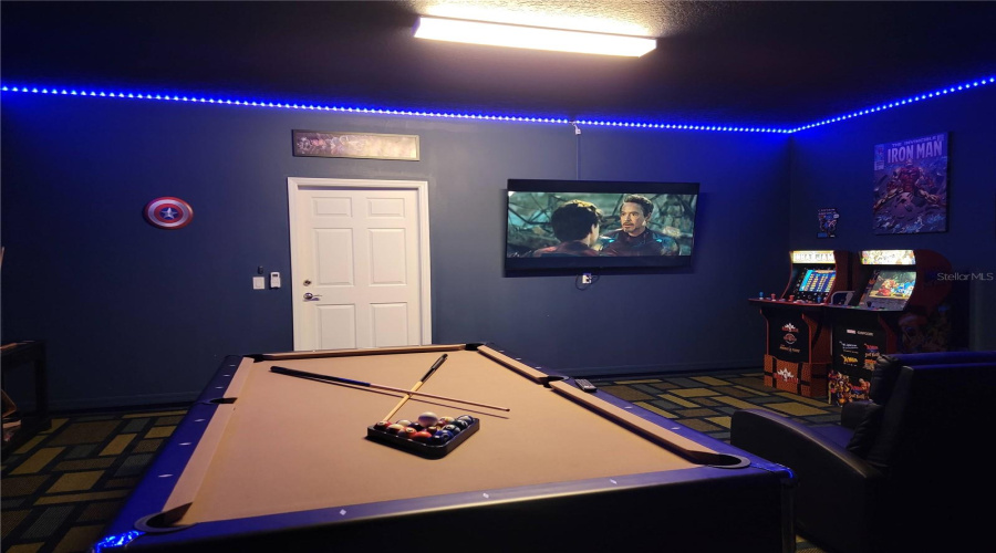 The garage has been transformed into a stylish air-conditioned MEDIA/GAME ROOM, adding tremendous entertainment value.