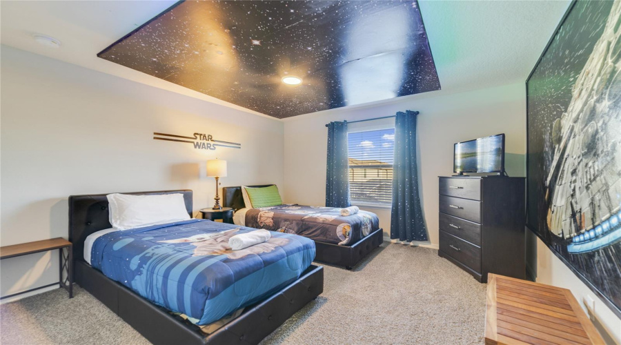 Guests can enjoy a stay in the Star Wars-inspired bedroom, designed with colorful character accents that add excitement and fun. Bedroom 3.