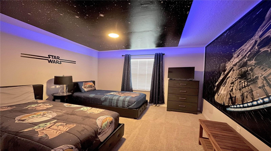 Guests can enjoy a stay in the Star Wars-inspired bedroom, designed with colorful character accents that add excitement and fun. Bedroom 3.