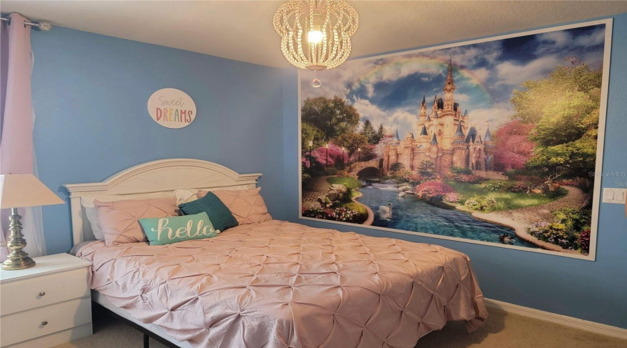 A vibrant Princess-themed bedroom adds a touch of fun and whimsy, perfect for kids or the young at heart. Bedroom 5.